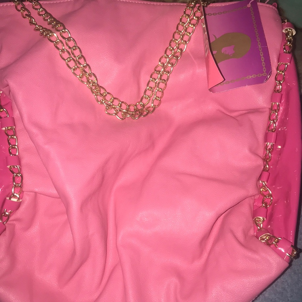 A pink Friday Nicki Minaj purse